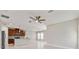 Bright, open kitchen featuring stainless steel appliances and a seamless transition to the living area at 13311 Dorado Shores Ave, Riverview, FL 33579