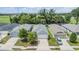 The house is front-facing with a two-car garage, a tidy lawn, and is situated in a well-kept neighborhood at 13814 Harvestwood Ln, Riverview, FL 33569