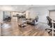 Bright, open-concept living area with hardwood floors and plenty of room for entertaining at 13814 Harvestwood Ln, Riverview, FL 33569
