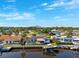 Waterfront home boasts a screened pool, boat lift and easy access to open waters for boating enthusiasts at 1399 49Th Ne Ave, St Petersburg, FL 33703