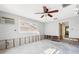 Spacious bedroom offering natural light and renovation potential with exposed studs at 1399 49Th Ne Ave, St Petersburg, FL 33703