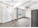 Entryway featuring tile flooring, a large window, and a white front door at 14135 Arbor Pines Dr, Riverview, FL 33579
