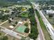 Expansive aerial view of the property showcasing its proximity to local amenities and surrounding landscape at 14312 1St St, Dade City, FL 33525