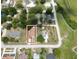 Drone image shows the layout of the home with a view of the surrounding neighborhood at 14312 1St St, Dade City, FL 33525