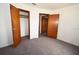 Comfortable bedroom boasts carpet, closet, and easy access to other rooms at 14312 1St St, Dade City, FL 33525