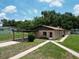 Charming single-story home with a covered carport, walkway, and simple landscaping at 14312 1St St, Dade City, FL 33525