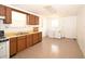Well-lit kitchen equipped with appliances and cabinets, offering a practical space for meal preparation at 14312 1St St, Dade City, FL 33525