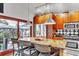 Spacious kitchen showcasing a granite island with seating, stainless appliances, and wood cabinets for ample storage at 161 27Th N Ave, St Petersburg, FL 33704