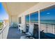Wide balcony offering stunning views of the ocean, perfect for relaxing and enjoying the coastal scenery at 17500 Gulf Blvd # 407, Redington Shores, FL 33708