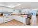 Bright open-concept kitchen leading to the living area with views of the ocean at 17500 Gulf Blvd # 407, Redington Shores, FL 33708