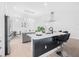 Open concept kitchen and dining area with stylish finishes and stainless steel appliances at 18036 Java Isle Dr, Tampa, FL 33647
