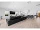 Expansive living room area with the kitchen in the background at 18036 Java Isle Dr, Tampa, FL 33647