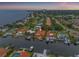 Scenic aerial view of a waterfront community, highlighting canal access and residential charm at 1931 Kentucky Ne Ave, St Petersburg, FL 33703
