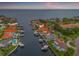 Real estate showcasing waterfront living with private boat docks and stunning canal views at 1931 Kentucky Ne Ave, St Petersburg, FL 33703