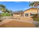 Beautiful backyard featuring a pool, dock, and outdoor area perfect for entertaining with palm trees at 1931 Kentucky Ne Ave, St Petersburg, FL 33703