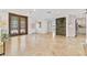 Foyer with tile floors, custom door and wine display at 1931 Kentucky Ne Ave, St Petersburg, FL 33703
