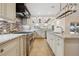 Spacious kitchen featuring stainless steel appliances, granite countertops, and custom cabinetry at 1931 Kentucky Ne Ave, St Petersburg, FL 33703