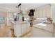 Lovely kitchen with large granite island and stainless steel appliances, great for cooking and entertaining at 1931 Kentucky Ne Ave, St Petersburg, FL 33703