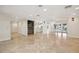 Expansive living room with tile floors, recessed lighting, and a built-in wine rack, creating an elegant entertaining space at 1931 Kentucky Ne Ave, St Petersburg, FL 33703