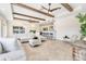 Bright living room featuring exposed beam ceilings, neutral colors, stylish decor and natural light at 1931 Kentucky Ne Ave, St Petersburg, FL 33703