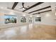 Sun-filled living room boasting large windows with canal views at 1931 Kentucky Ne Ave, St Petersburg, FL 33703