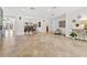 Bright and airy living room with a view into the dining area and outdoor waterfront at 1931 Kentucky Ne Ave, St Petersburg, FL 33703