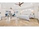 Spacious main bedroom with tile flooring, tray ceiling, and sitting area at 1931 Kentucky Ne Ave, St Petersburg, FL 33703