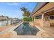 Beautiful pool and spa offer a peaceful backyard with water views at 1931 Kentucky Ne Ave, St Petersburg, FL 33703
