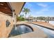 Inviting pool and spa area with lion's head fountains and dock access at 1931 Kentucky Ne Ave, St Petersburg, FL 33703