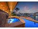 Tranquil spa with a lion fountain adds a touch of elegance to the waterfront pool and dock area at 1931 Kentucky Ne Ave, St Petersburg, FL 33703
