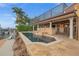 Outdoor living space features a pool, dock, and waterfront views at 1931 Kentucky Ne Ave, St Petersburg, FL 33703