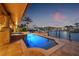 Beautiful pool and spa with waterfront views, ideal for relaxation and entertaining by the canal at 1931 Kentucky Ne Ave, St Petersburg, FL 33703