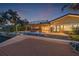 Waterfront home with a spacious backyard, featuring a pool, dock, and ample entertaining space at 1931 Kentucky Ne Ave, St Petersburg, FL 33703