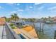 Breathtaking view showcasing the canal and boat docks from the home's outdoor area at 1931 Kentucky Ne Ave, St Petersburg, FL 33703