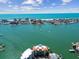 Aerial view of Majestic Point waterfront condo with city views at 200 Skiff Pt # 202, Clearwater Beach, FL 33767