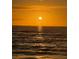Beach at sunset with tranquil waters at 200 Skiff Pt # 202, Clearwater Beach, FL 33767