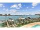 Boat docks with a water view and city views in the distance at 200 Skiff Pt # 202, Clearwater Beach, FL 33767