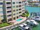 Waterfront condo community pool and boat docks at 200 Skiff Pt # 202, Clearwater Beach, FL 33767