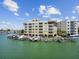 This condominium complex provides residents with waterfront views and boating access to enjoy the coastal lifestyle at 200 Skiff Pt # 202, Clearwater Beach, FL 33767