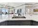 Close up of kitchen island with stainless steel sink and views to the water at 200 Skiff Pt # 202, Clearwater Beach, FL 33767