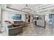 Open-concept living space with luxury furnishings and views to the water at 200 Skiff Pt # 202, Clearwater Beach, FL 33767