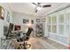 Office area with a glass desk and storage at 200 Skiff Pt # 202, Clearwater Beach, FL 33767