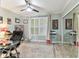 Office area with a glass desk and storage at 200 Skiff Pt # 202, Clearwater Beach, FL 33767