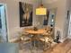 Cozy dining room with round table, seating for four, and stylish decor at 20938 Sunsweet Ct, Land O Lakes, FL 34637