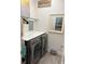 Functional laundry room features newer washer and dryer and ample storage at 20938 Sunsweet Ct, Land O Lakes, FL 34637
