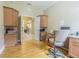 Bright office space with custom cabinetry, hardwood floors, and ample storage at 2124 Rensselaer Dr, Wesley Chapel, FL 33543