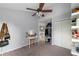 Bedroom with a ceiling fan, closet, and vanity area for comfortable living at 2318 Kenwick Dr, Valrico, FL 33596