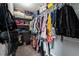 Walk-in closet with ample hanging space and shelving for organized storage at 2318 Kenwick Dr, Valrico, FL 33596