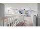 A view of the upper level landing, showcasing the open floor plan and natural light at 2318 Kenwick Dr, Valrico, FL 33596