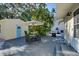 Spacious backyard deck area with seating and grill, ideal for outdoor gatherings and relaxation at 284 North St, Palm Harbor, FL 34683